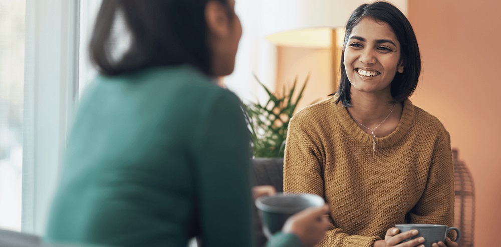 Women talking over a cup of tea