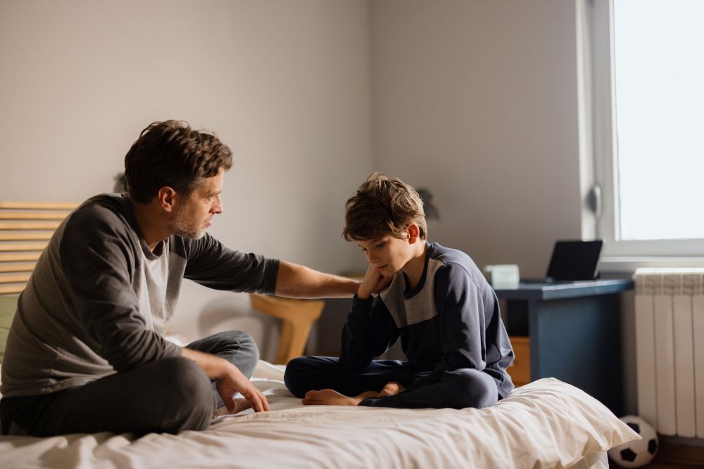 Father and son talking.