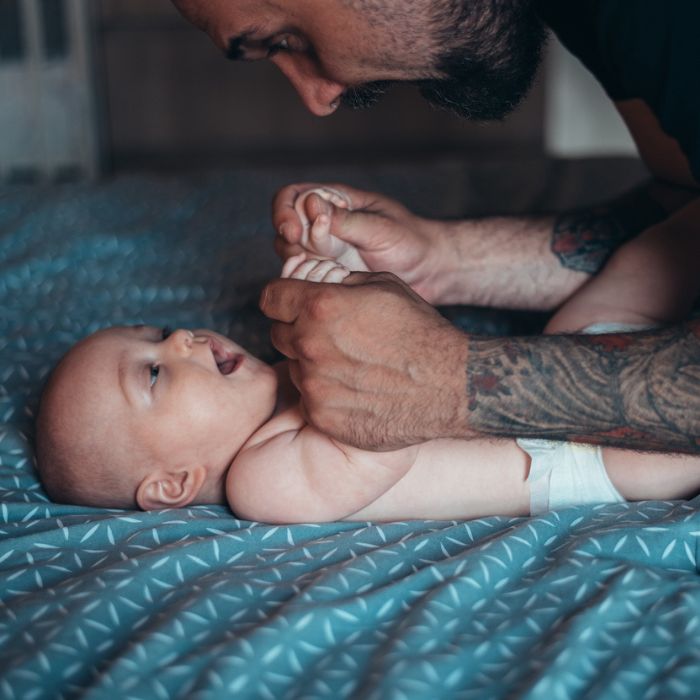 Smiling baby with dad