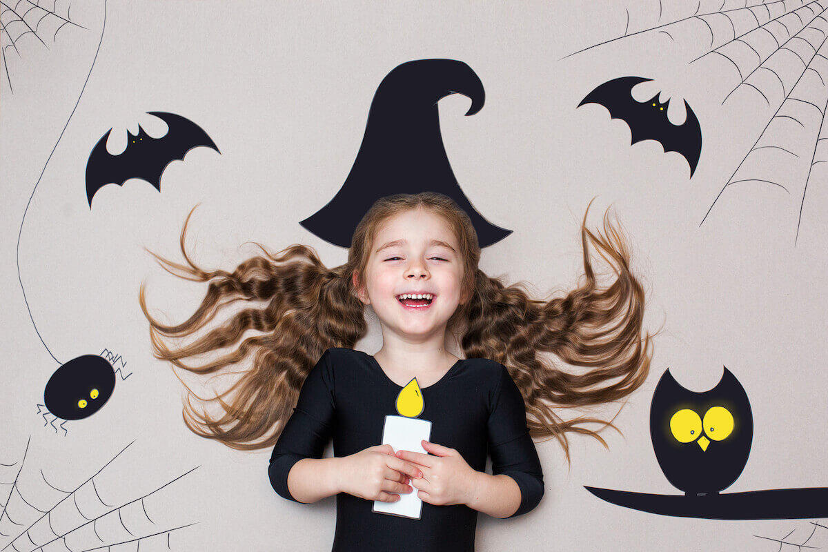 Little girl dressed as a witch for Halloween