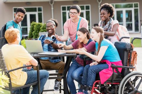 Group of teens talking and laughing together