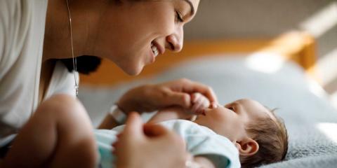 Mother smiling at her baby