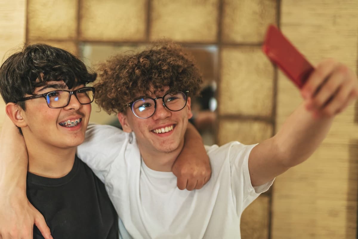 Two teen boys taking a selfie