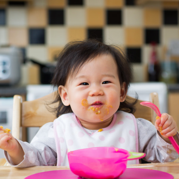Photo of a toddler eating 
