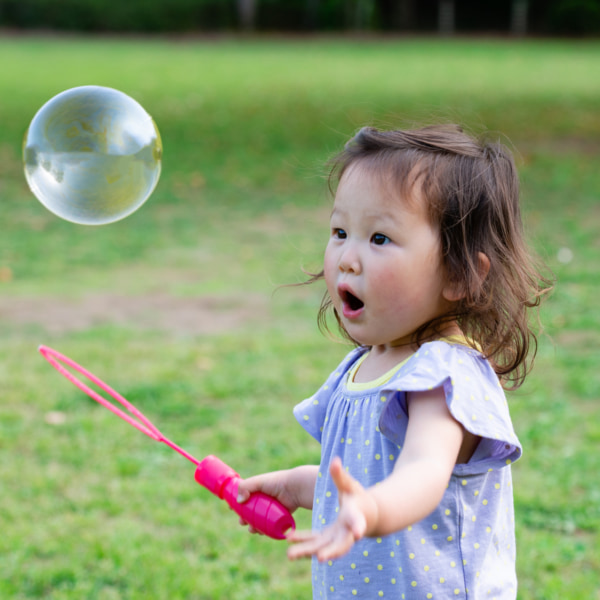 Photo of toddler with bubble
